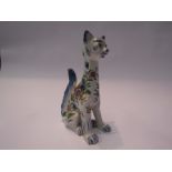 A 1920's mosaic faience cat with glass eyes