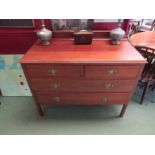 An Edwardian walnut two over two drawer dressing chest,