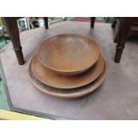 Three teak bowls