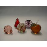 Five various art glass paperweights including fruit form