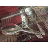 A three piece silver dressing table set