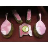 Pink guilloche and silver dressing table brushes (4) and an easel back timepiece a/f