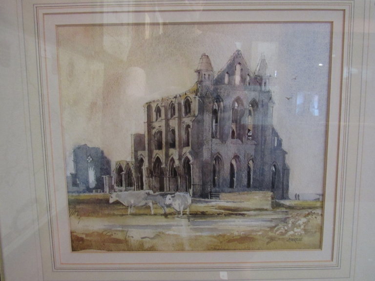 A framed and glazed watercolour of Abbey ruins and cattle, signed MORRIS lower right,