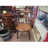 A Victorian fruitwood penny seat elbow chair on turned legs joined by an 'H' stretcher,