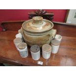 A large Studio pottery lidded jar with eight stoneware marmalade jars