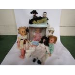 A collection of mixed plastic and bisque dolls including boxed Pedigree 'First Love' doll