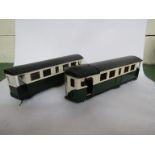 A gauge 1 live steam LNER Steam Sentinel railcar in green and cream livery together with matching