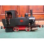 A Mamod gauge 1 live steam 0-4-0 locomotive in black livery,