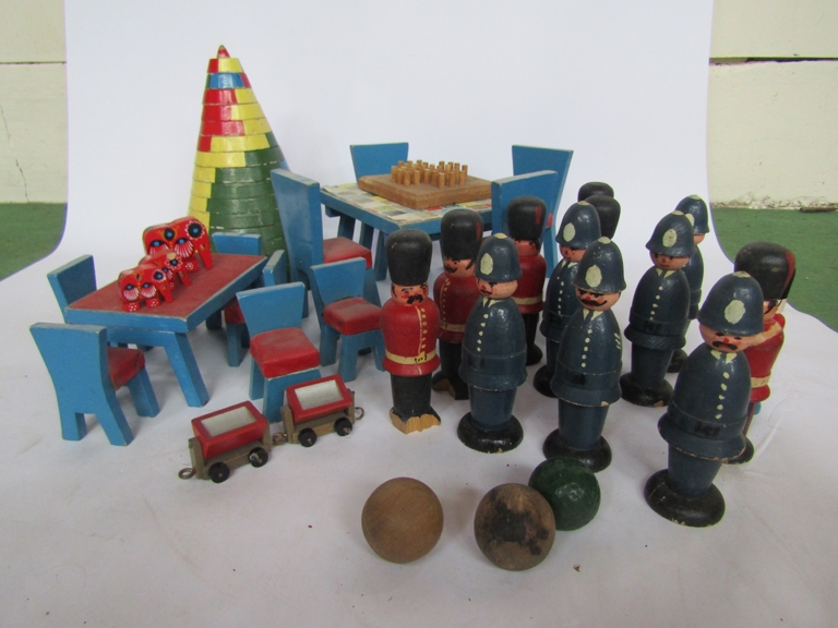 Assorted vintage wooden toys including conical tower puzzle, dolls' furniture,