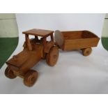A handmade oak tractor and tipping trailer with brass makers plaque