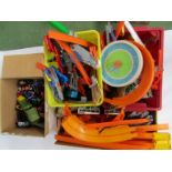 A quantity of plastic toys including Hot Wheels track together with a box of Hot Wheels and other