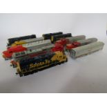 Nine 00 gauge 'Santa Fe' locomotives including Atlas and RSD together with one carriage