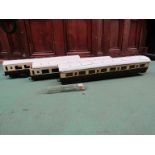 Three wooden kit built gauge 1 GWR coaches in brown and cream livery,