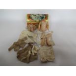 A small German bisque head girl doll with jointed composition body,