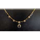 A sapphire and diamond necklace each two sapphires linked by a diamond daisy,