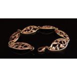 A 9ct gold floral panel bracelet, 19cm long,