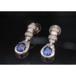 A pair of white gold and platinum sapphire and diamond drop earrings, 4.63ct sapphire, 2.