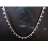 An 18ct white gold diamond necklace, 1.