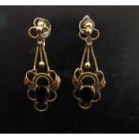 A pair of gold drop earrings with a pear cut amethyst coloured stone, unmarked, 4.5cm drop, 7.