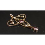 A gold Edwardian pendant set with garnet and pearl, stamped 9ct, 4cm drop, 2.