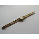 A 9ct gold Omega lady's wristwatch, 17.