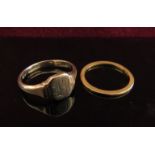 A gold wedding band, marks rubbed, 1mm wide. Size M/N, 1.7g and a 9ct gold signet ring. Size P/Q, 3.