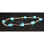 A gold and turquoise bracelet stamped 18k, 19.5cm long, 7.