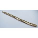 A gold flat link bracelet marked 14kt, Italy,