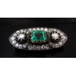 A diamond and emerald brooch 1.30ct emerald, 2.