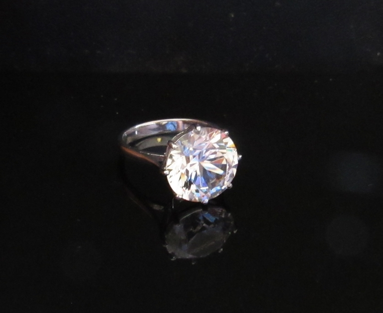 An 18ct gold ring set with a large white zircon. Size M, 5.