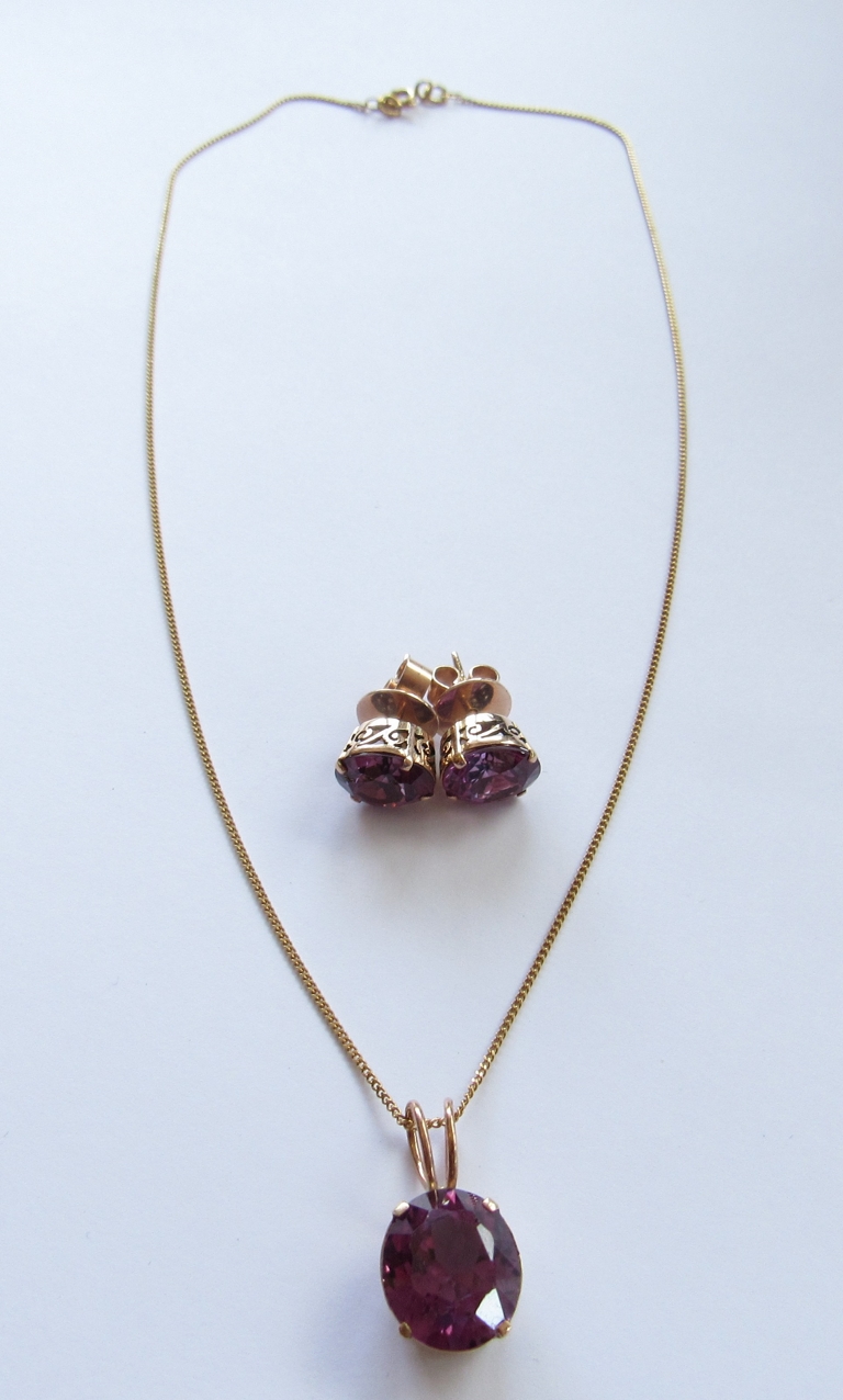 A pair of gold alexandrite earrings, unmarked with a matching pendant hung on an 18ct gold chain, - Image 2 of 3