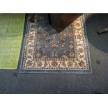 A Carpetright blue ground rug,