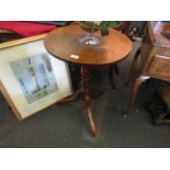 An oak wine table on tripod base