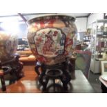 A large Chinese fish bowl on stand,