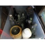 A box containing a quantity of bygone bottles and stoneware flagons etc