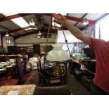 A Victorian brass ceiling hanging oil lamp with white glass shade and Veritas burner