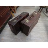 Two leather travelling suitcases,