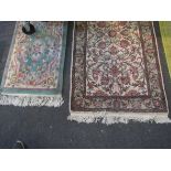 Two Chinese flower design floor rugs,