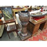 A 19th Century French glazed jardiniere on stand with lion mask details,