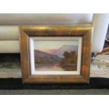 An unsigned framed unglazed, mountain and water scene,