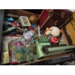 A box containing various toys and a small case of records etc.