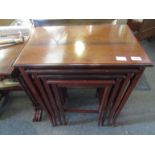 A quartet of mahogany tables with chequered line inlay to top,