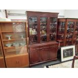 An astragal glazed top over three drawer display cabinet,