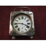 A Walker & Hall silver cased travel clock with jumbo pocket watch to interior