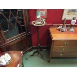 A mahogany jardiniere stand on fluted column and tripod feet,