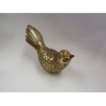 A gilt fan tail bird figure