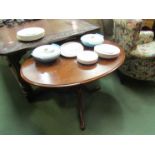 A mid Victorian burr walnut oval tilt top table on turned column and tripod base,