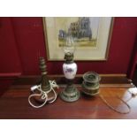 A brass oil lamp converted to electrical,
