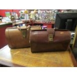 Two leather Gladstone bags