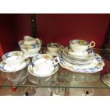 A Wetley china teaset with blue border and floral decoration